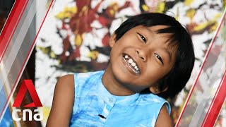 The 7-year-old Thai abstract artist who has her own fabric label
