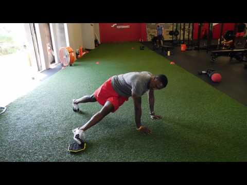 Plank Scissor Hips on Slide
