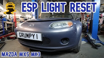 Mazda MX-5 ESP traction light reset. Orange light fix after battery replacement.