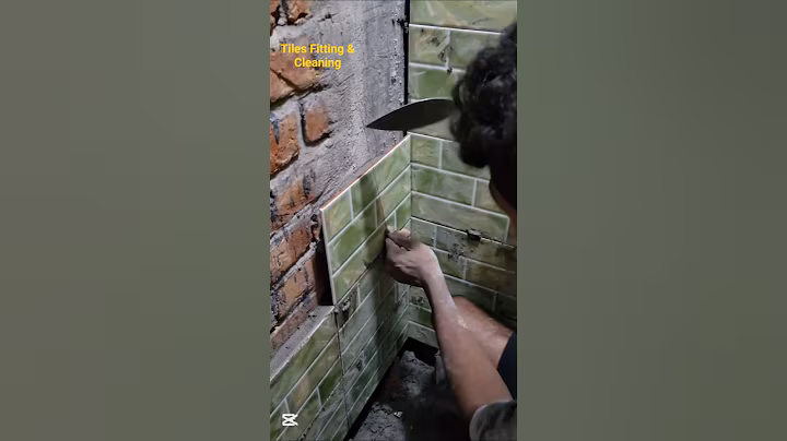 I'm putting on a tie and measuring it with a thread to see if everything is okay#reel#walltilesvideo