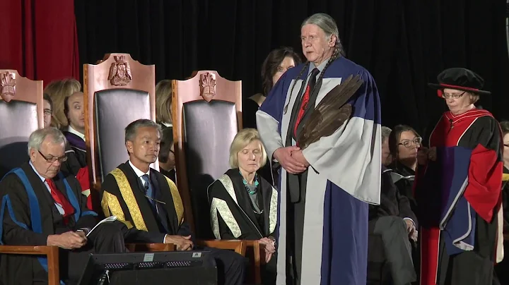 Thomas R. Louttit awarded degree of Doctor of Laws...