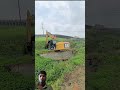 Amphibious Excavator Plowing Into Ditch for Clearing Green Water Hyacinth !