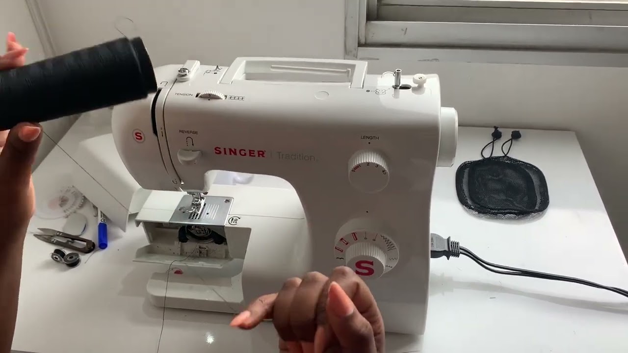 Maquina de costura (Confecção de Wigs)