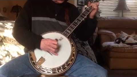 Dennis plays John Hardy on banjo