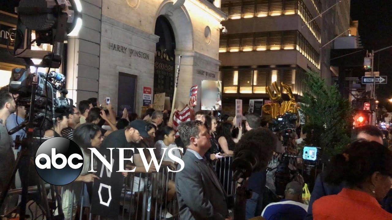 Trump greeted by protesters on his return to Trump Tower