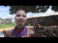 A Woman From UK Having A Great Time In Korcho Village Of Kara Tribe Deep In Omo Valley A Woman From UK Having A Great Time In Korcho Village Of Kara Tribe Deep In Omo Valley