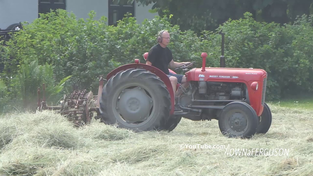 Massey Ferguson 35X w/ Multi-Power in the field raking hay w/ JF HSR 240R Hay Rake | DK Agriculture
