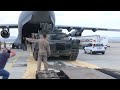 US Army, Nato. M1A2 Abrams tanks unloaded from C-17 aircraft in Bulgaria.