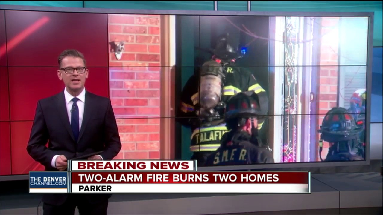 Two-alarm fire burns two homes in Parker - YouTube
