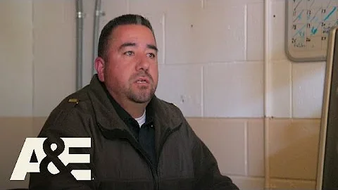 Behind Bars: Rookie Year: CO Mangin Passes a Phone...