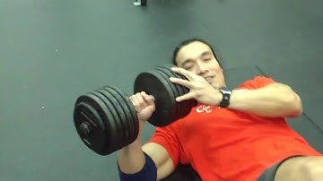 110lb single arm dumbell floor press