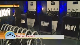 Erica Checks Out Navy Simulator at California Capital Airshow