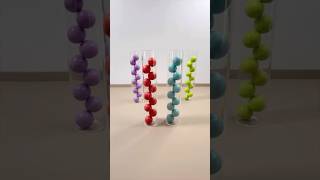 The Satisfying Filling Of Gl Jars With Colorful Wood Balls In Reverse