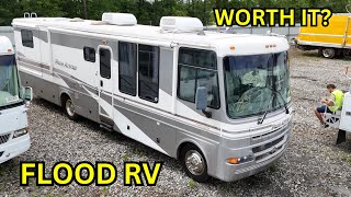 MIKE CHECKS OUT A FLOOD RV  IS IT WORTH BUYING?