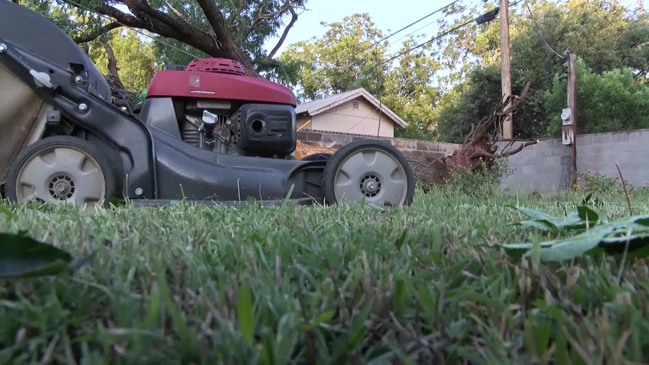 Watch: Man Nearly Killed Mowing Lawn During Storm