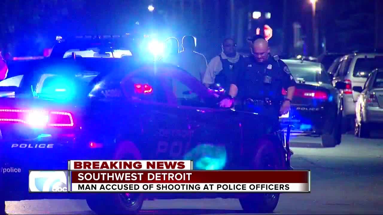Police search for man accused of shooting at officers in Detroit - YouTube