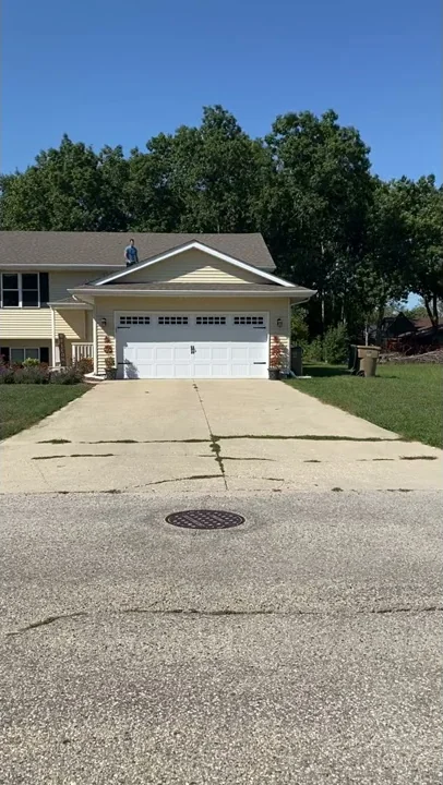Throwing a Bag Over the Roof Into the Trash.