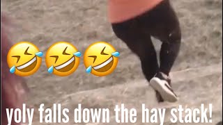 SHE FALLS DOWN THE HAYSTACK!