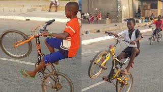 YOUNG BICYCLE RIDERS DISPLAYING THEIR SKILLS INSIDE ACCRA