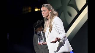 Jerrod Carmichael Presents Kylie Kelce With Her 2026 Webby Podcast of the Year Award