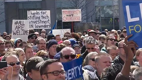 Companies, states weigh Indiana boycott over new law