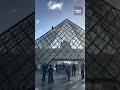 Climate activists scale Louvre Pyramid, spraying it with orange paint #Paris #louvremuseum