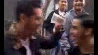 2 Rockabilly Guys Crushing A Plastic Glass
