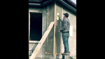 Plastering quoin stones.