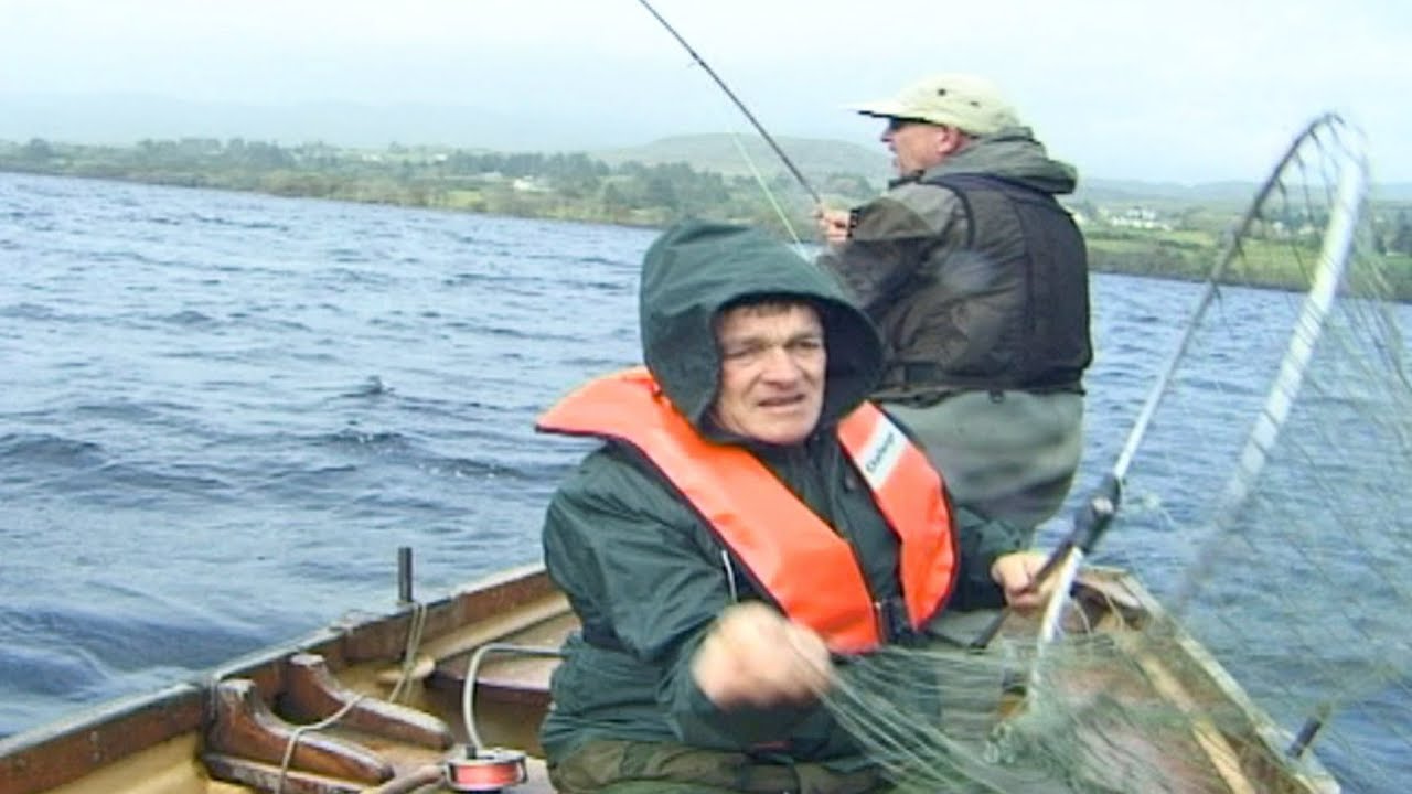 A big salmon is being hooked on Lough Eske, County Donegal, Ireland