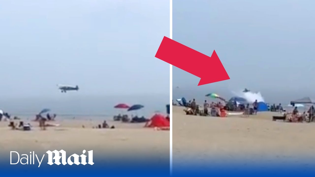 Shocking moment plane flips over and crashes in front of beachgoers in New Hampshire