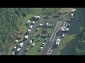 Skydiving plane goes off New Jersey runway and crashes into woods, sending at least 15 to hospital
