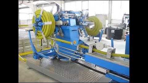 Automatic pipe coiler and pipe coiling strapping machine