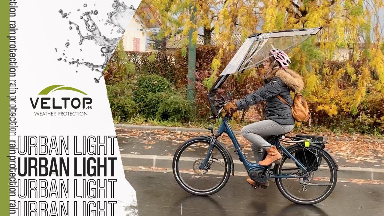 VELTOP URBAN LIGHT - Su una bicicletta elettrica sotto la pioggia - YouTube