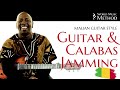 Combining with the calabas  malian guitar evolution  world music method