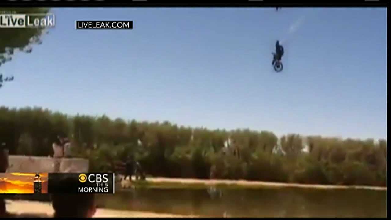 Motorcycle stuntman overshoots jump: On tape - YouTube