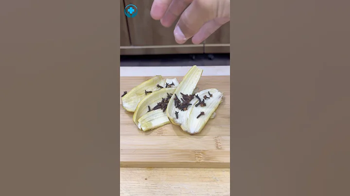 Put cloves on banana peel, the bay leaves and cinnamon sticks