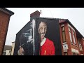 Murals and liverpool football culture around anfield