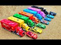 Lightning mcqueen and construction vehicles playing in the sand  toy car story