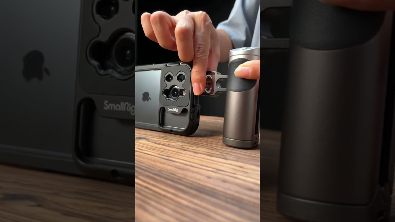 A power full phone with a cage kit dual handheld and 1.55X Anamorphic lens