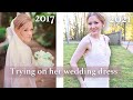 Sara tries on her handmade wedding dress 4 years later
