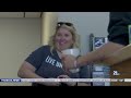 United Way volunteers assemble hygiene kits for teens