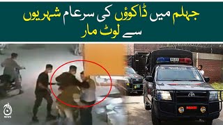 Unidentified individuals in official number plate car create chaos on main street of Jhelum