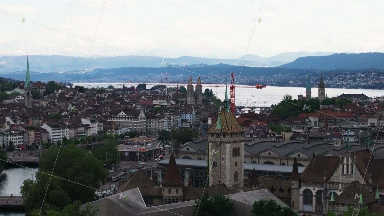 Aerial ascending footage of historic buildings of Swiss National Museum. Revealing old town and lake