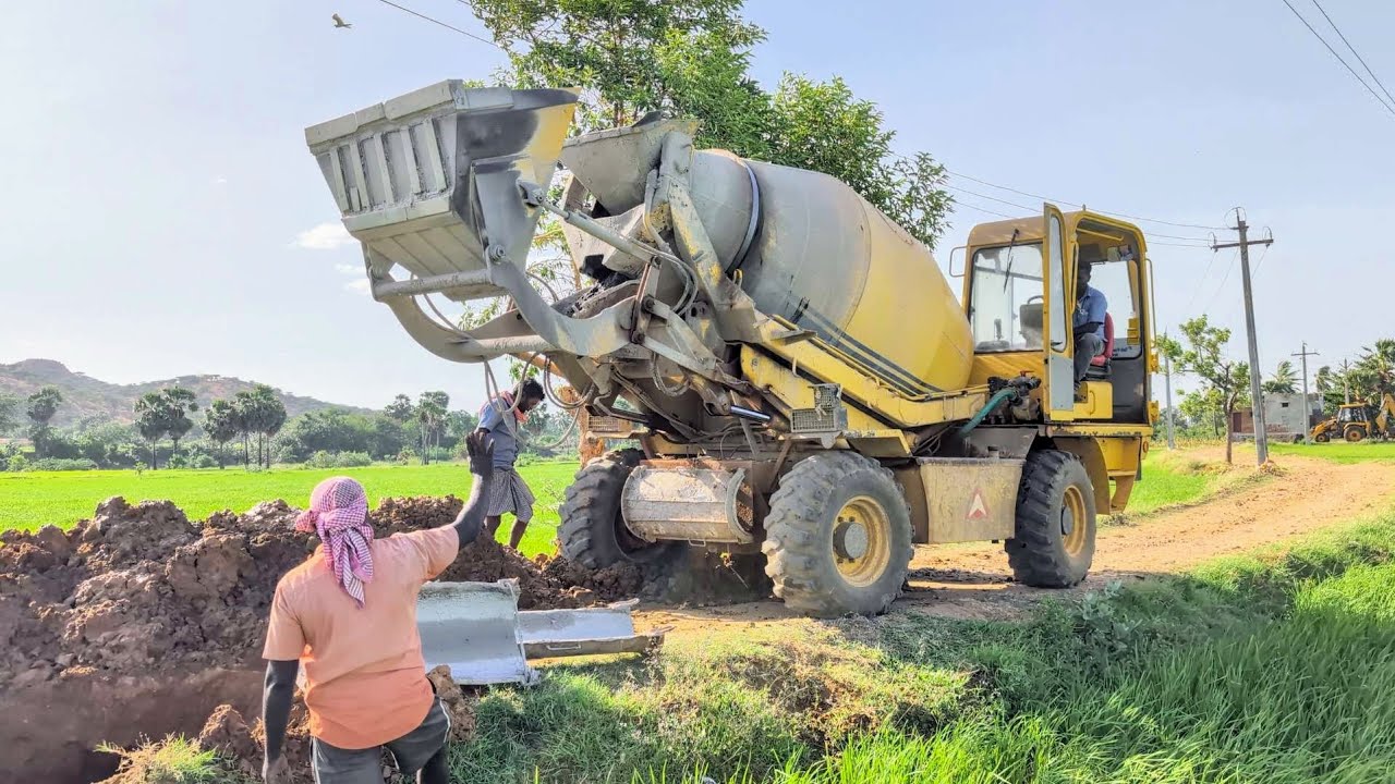 AJAX AGRO 4000 concert mixing machine working in village side pipeline 