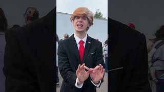 Michigan Resident Shows Off Trump Impression Outside Walker Rally