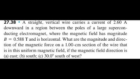 A straight, vertical wire carries a current of 2.60 A downward in a region between the poles of a la