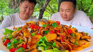 Two pork tripe fried with green pepper  mixed with rice to eat two large bowls!