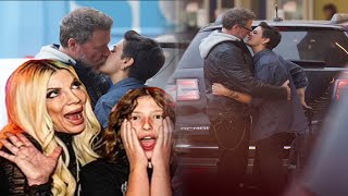 Wow! Tori Spelling's estranged husband Dean McDermott, KISSES new girlfriend Lily Calo, as they pack