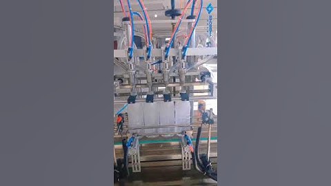 Plastic water bottles filling machine. Filler machine