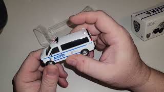 596 1/64 diecast car model NYPD police  Chevrolet Express